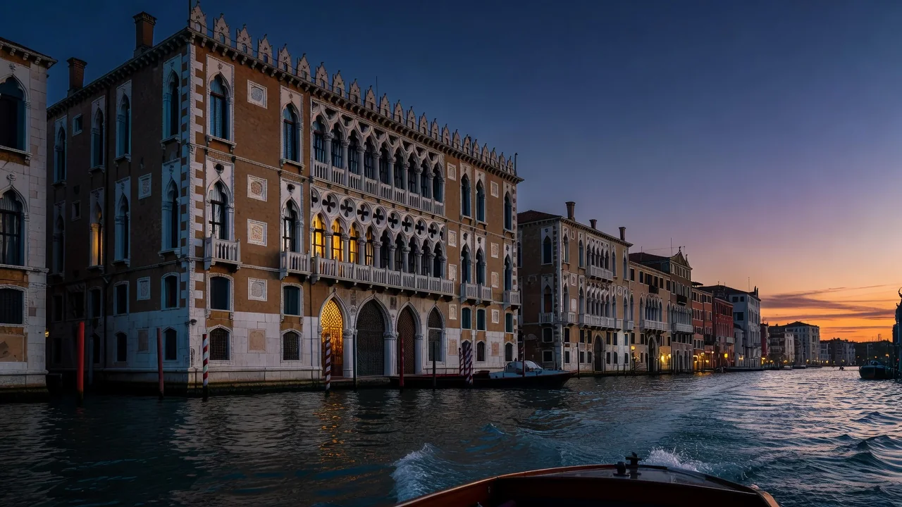 Grand Canal palazzo of Casino di Venezia photographed from a vaporetto at dusk